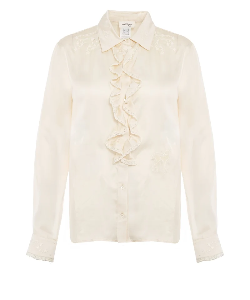 Blusa con ricami